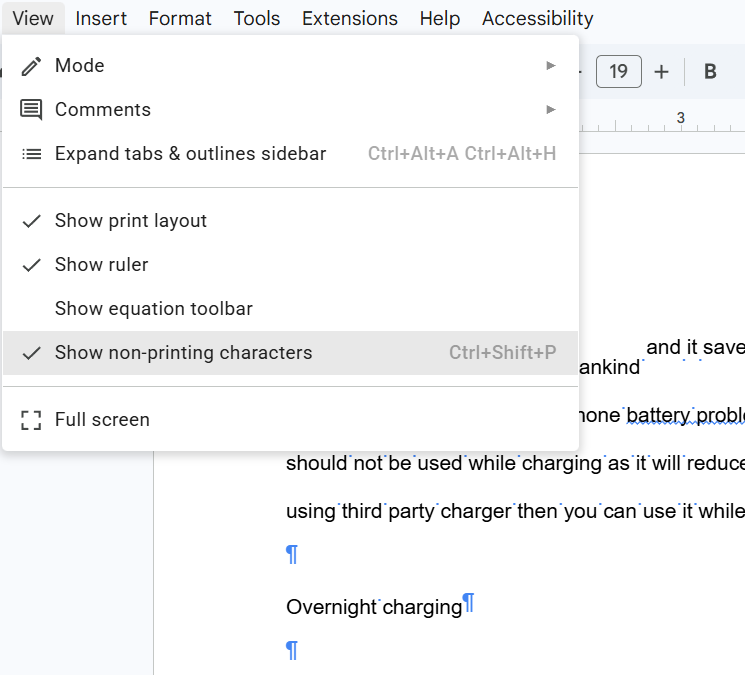 Google Docs View menu showing non-printing characters option to reveal hidden paragraph marks